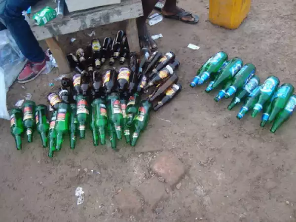 Photo of empty beer bottles seen after a wake keep/funeral in Benue State